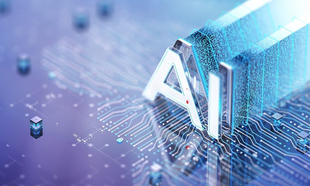 The letters AI rendered in metallic type above a circuit board