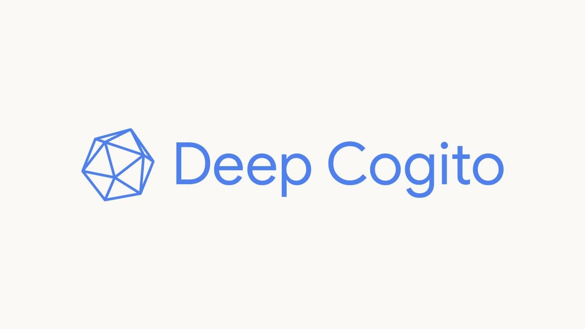 O logotipo da Deep Cogito em azul ao lado de seu símbolo poliedro facetado, sobre fundo branco.