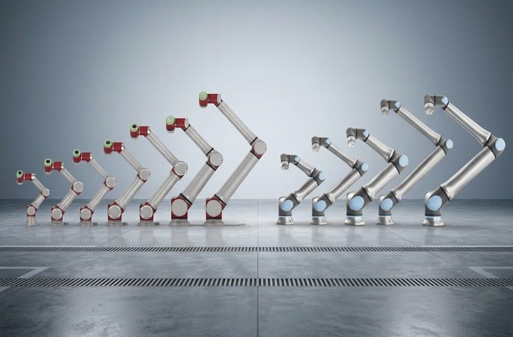 A row of collaborative robot arms in graduated poses against a plain studio background